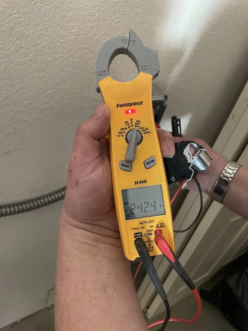 Voltage testing with clamp meter during Outlet Installation in Oregon City